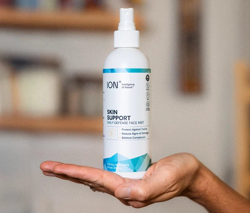 ION* Skin Support daily defense face mist held in hand